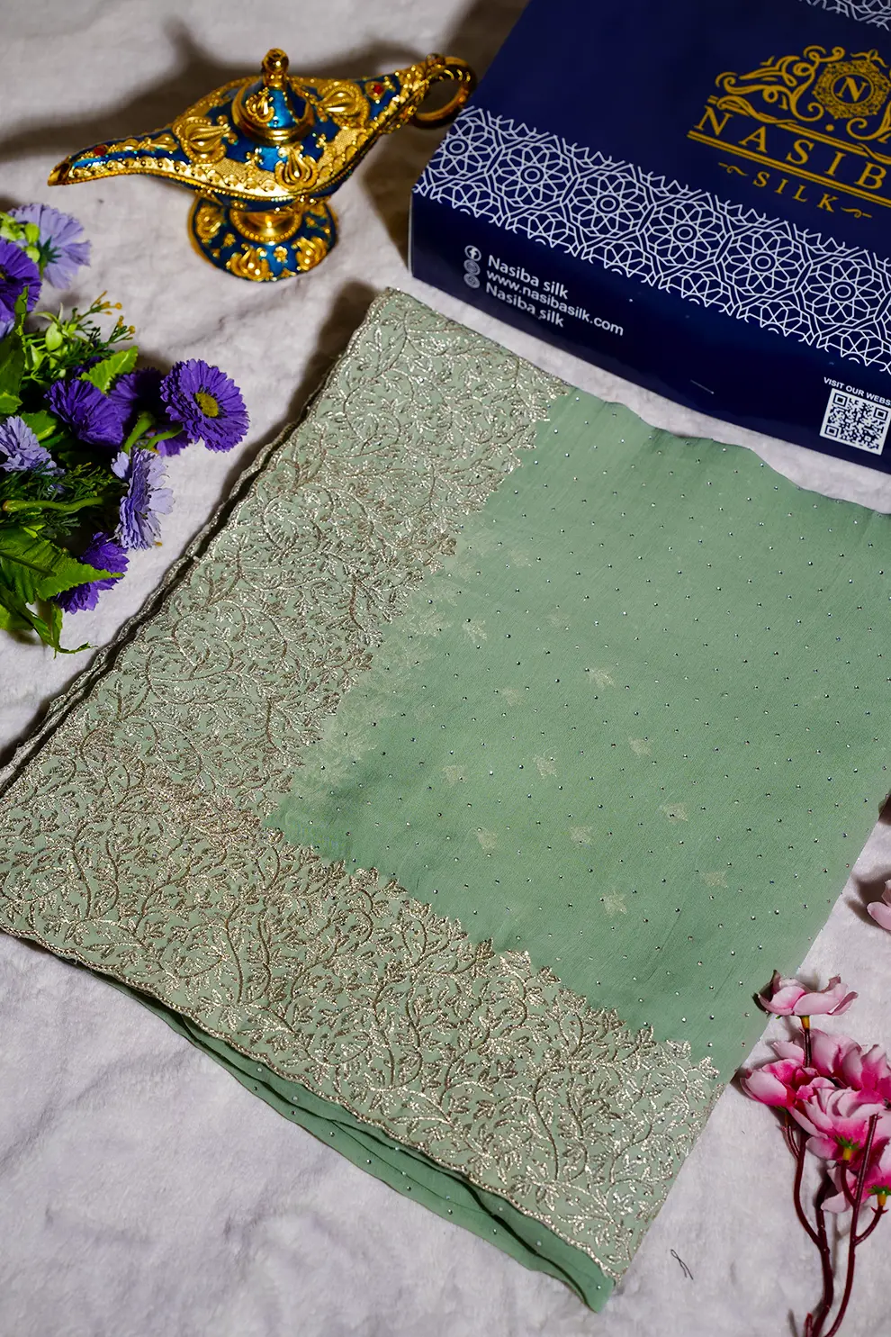 Light pesta Silk Blend Saree with premium Embroidery Glass Stone